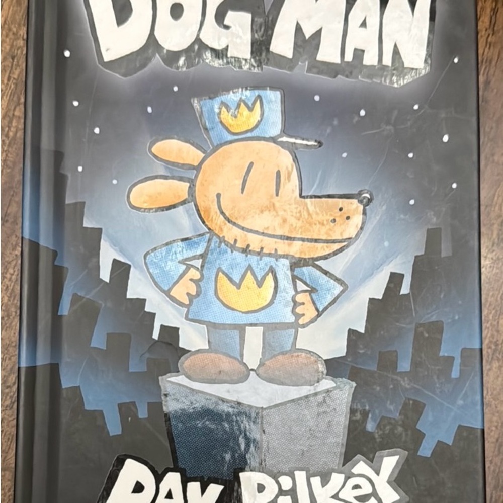 Blue and Black Cartoon Dog Man Graphic Novel